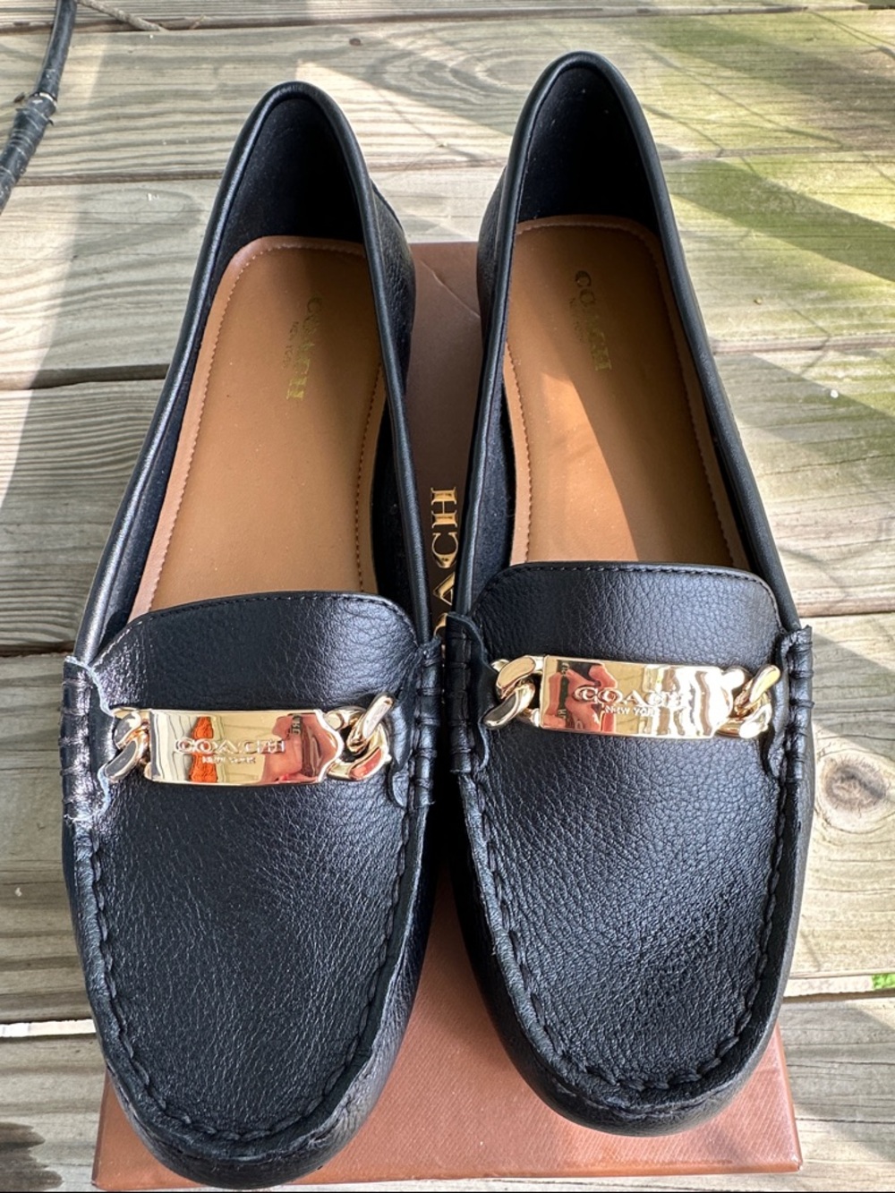 Coach Black Leather Loafers with Gold Plaque
